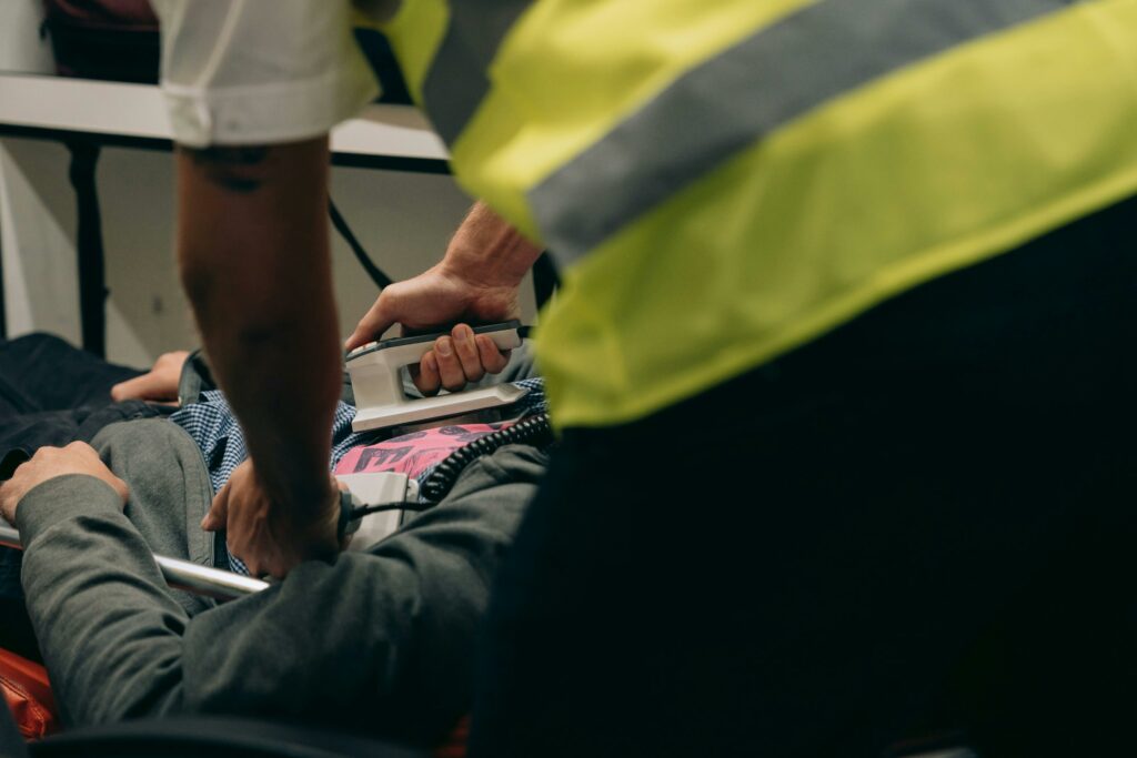 EMT using defibrilator