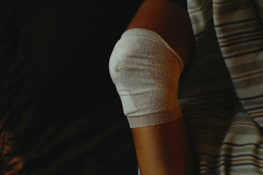 Injured knee wrapped in bandage
