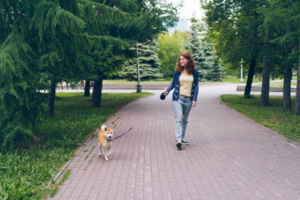 Woman walking dog