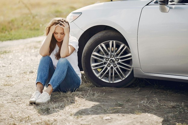 Woman stressed after car accident