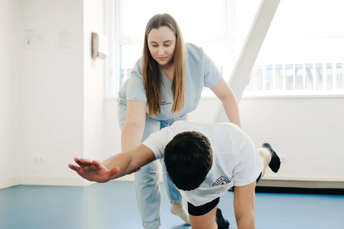 man in physical therapy session
