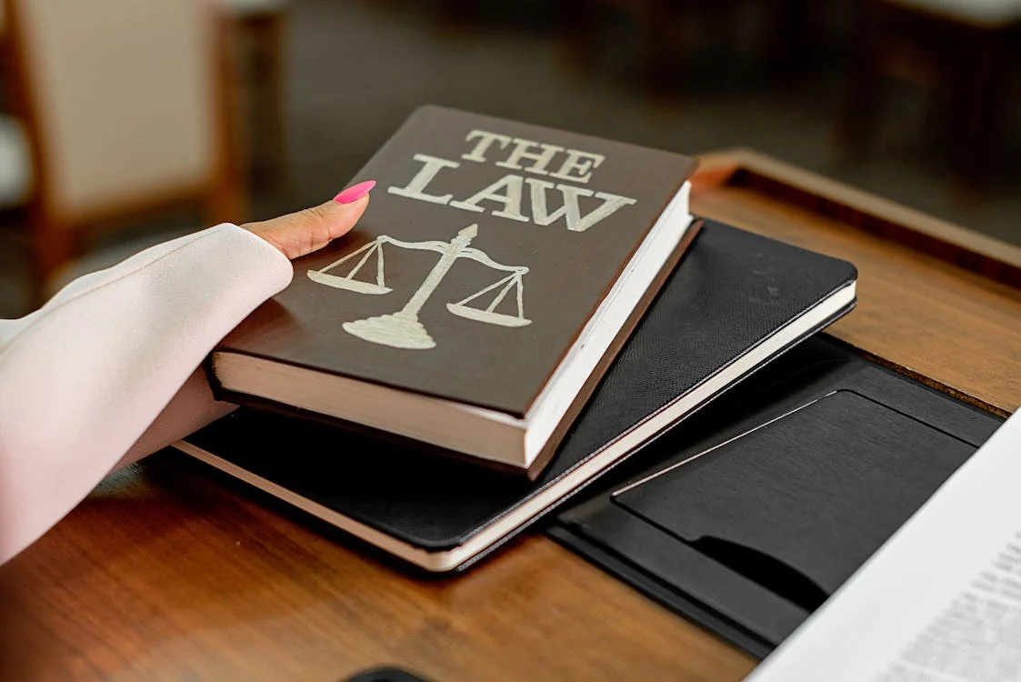 person holding the law book
