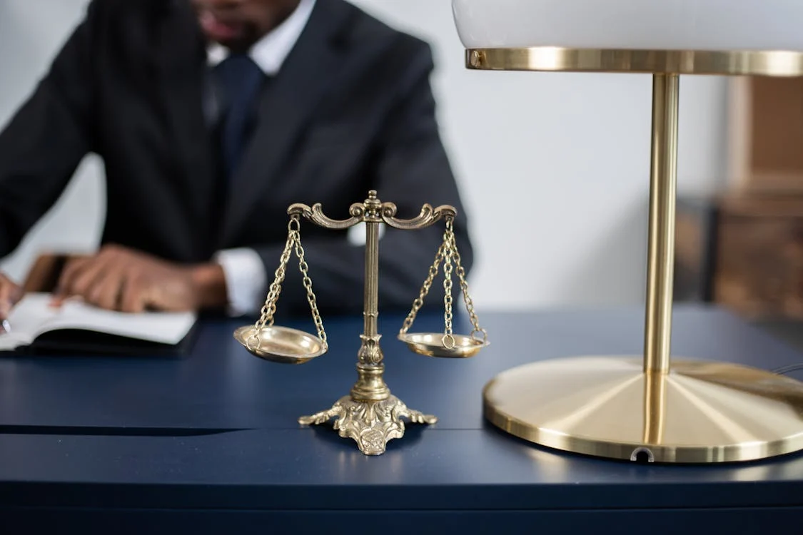 Balance scale on top of lawyer's table