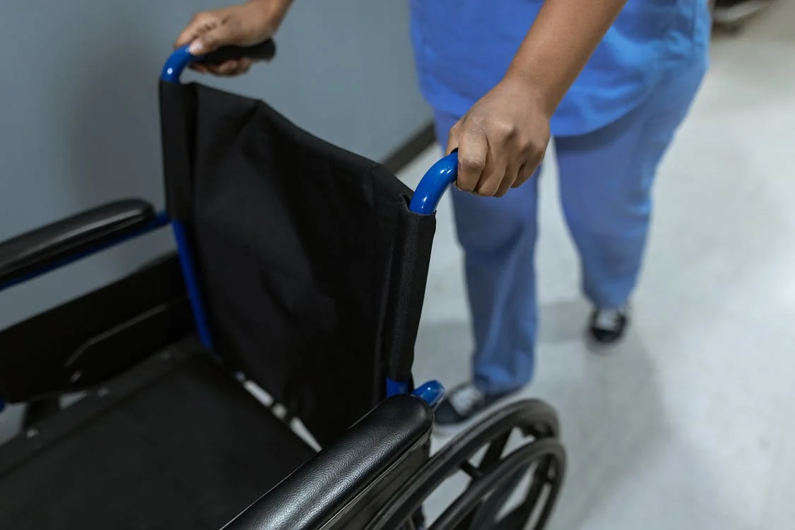 Nurse pushing a wheelchair