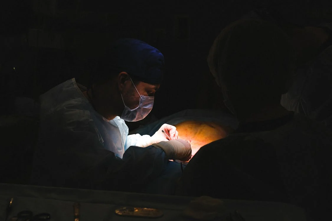 surgeon operating on a patient