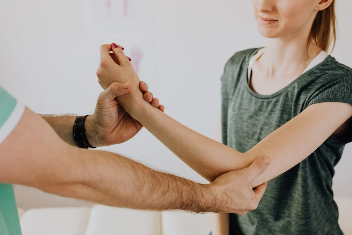 female patient in physical therapy session