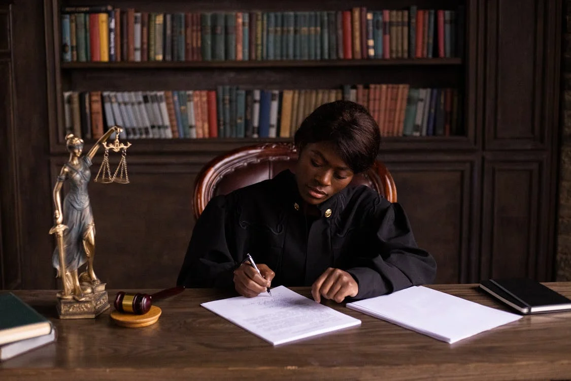 judge writing a document