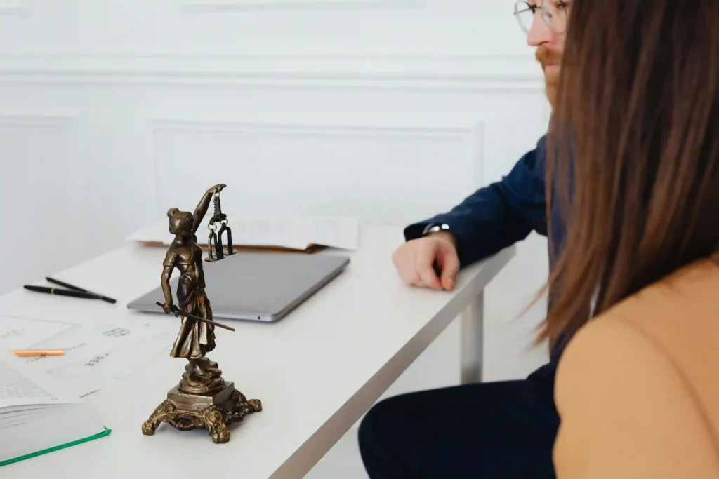 lady justice statue and clients