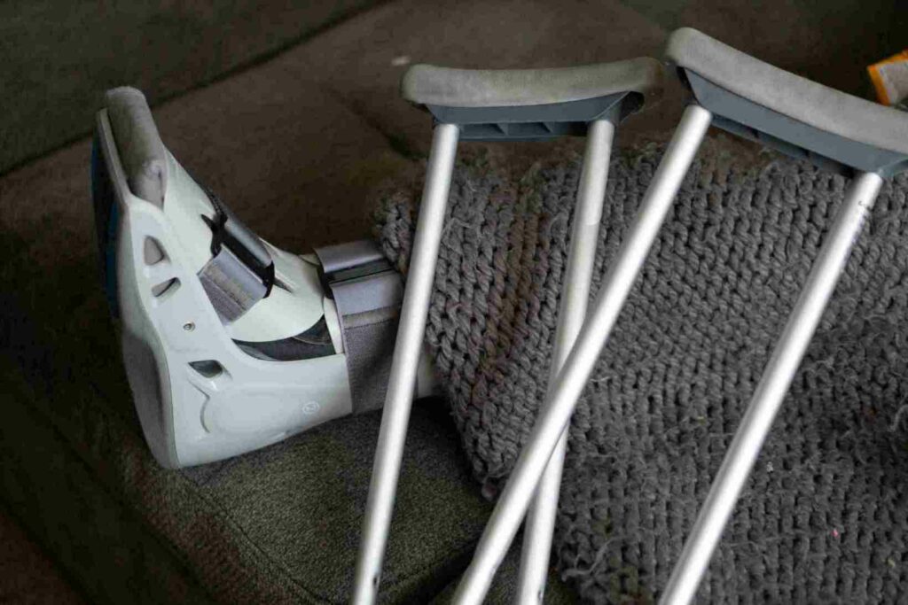 injured leg beside crutches