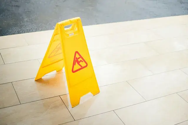 yellow wet floor sign