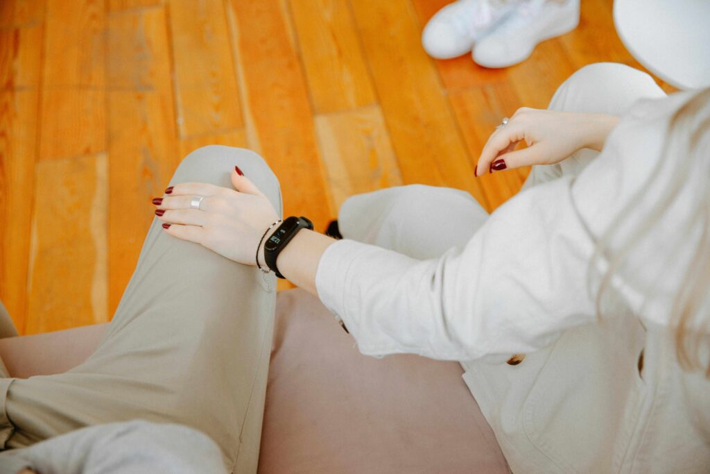 a woman touching a man's leg