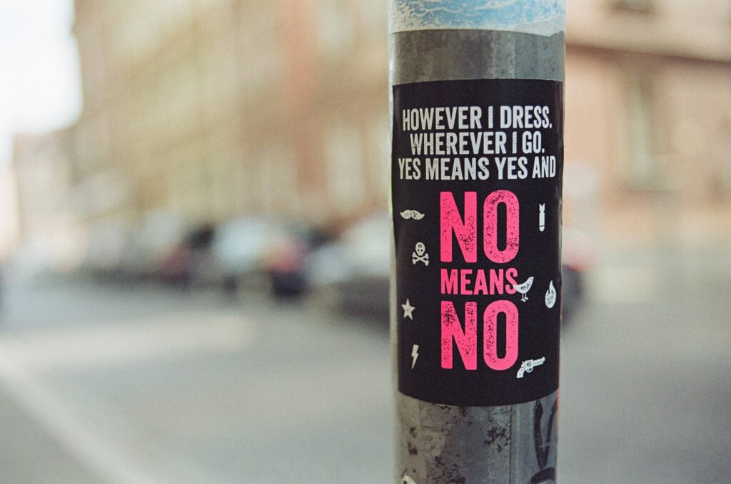 no means no sign on a post