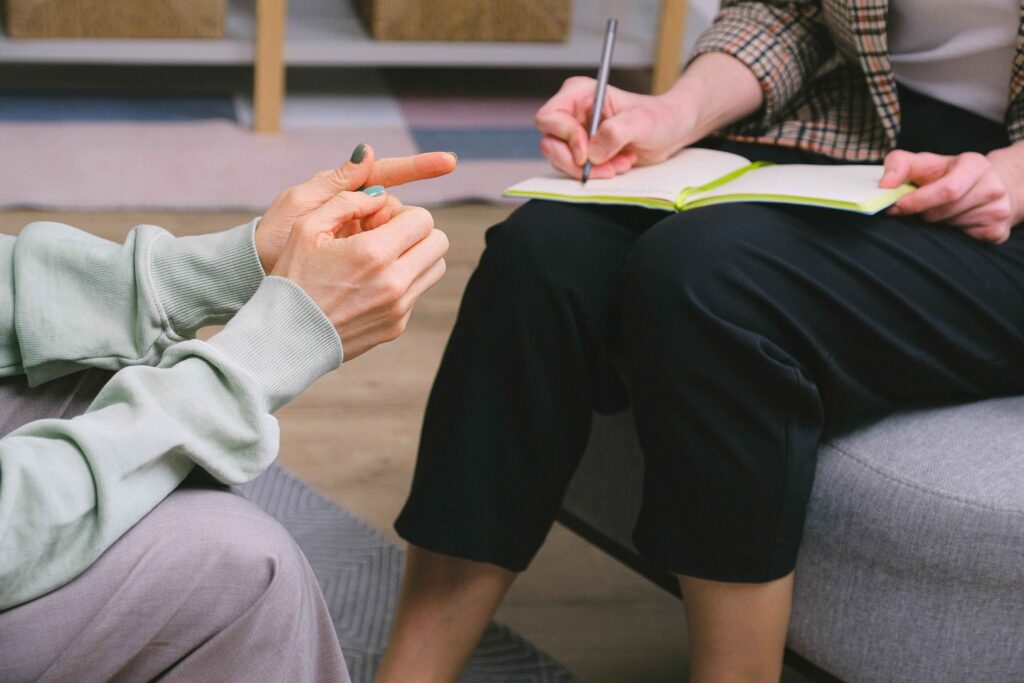 therapist talking to a patient
