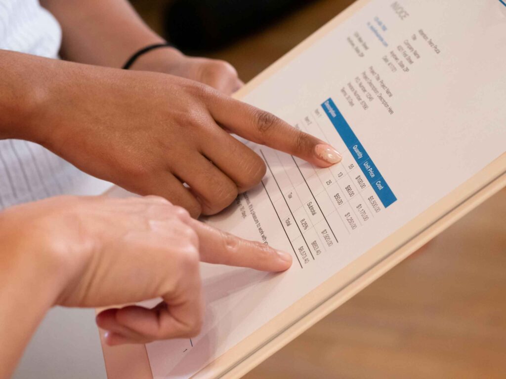two people reading the medical bill