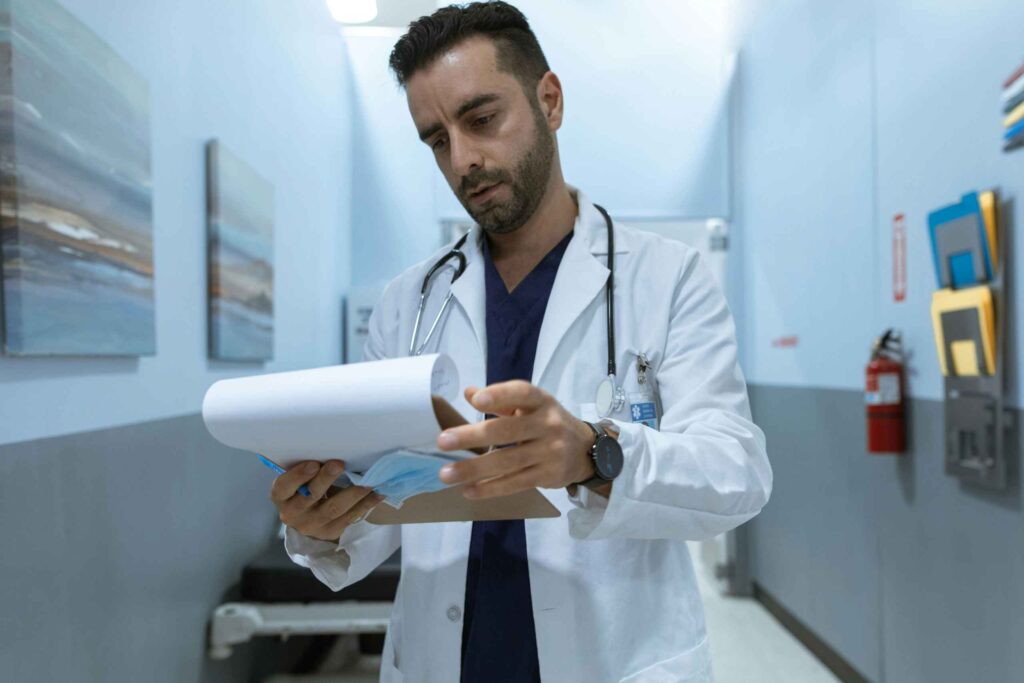 doctor reading a medical diagnosis