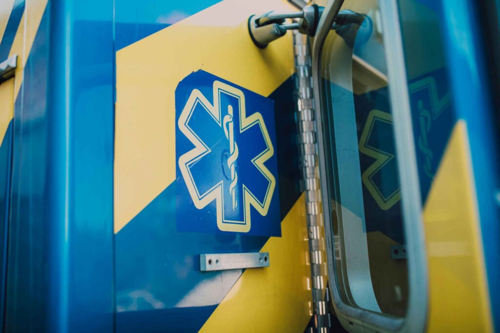 blue and yellow ambulance
