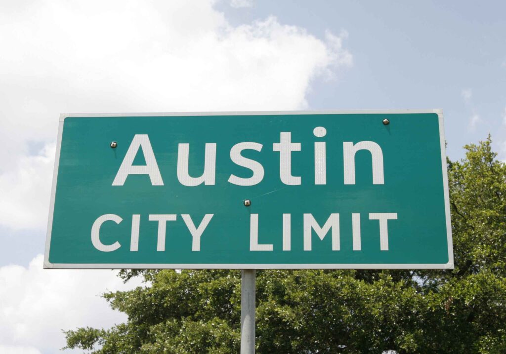 Austin city limit road sign