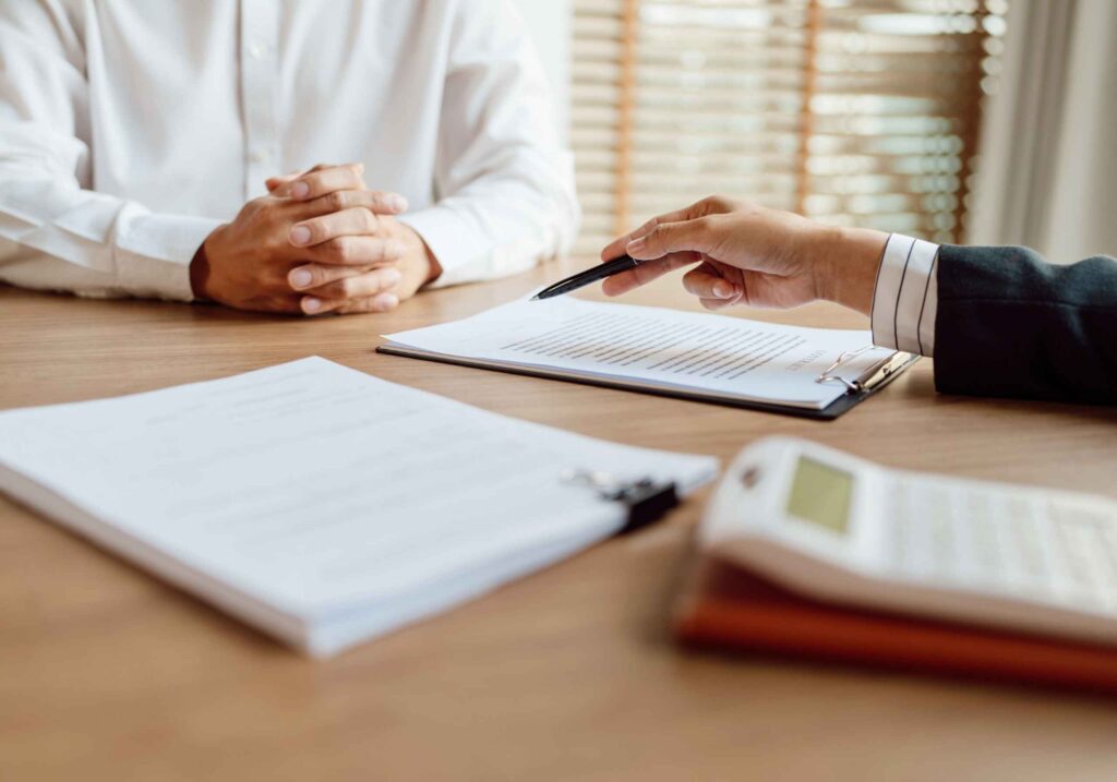 lawyer explaining written document to a client